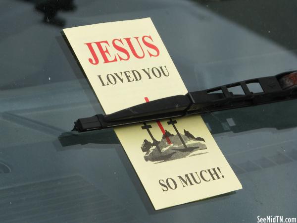 Religious pamphlet on a windshield