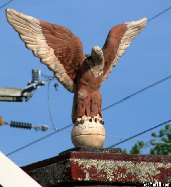 Eagle at an old storefront - Loretto