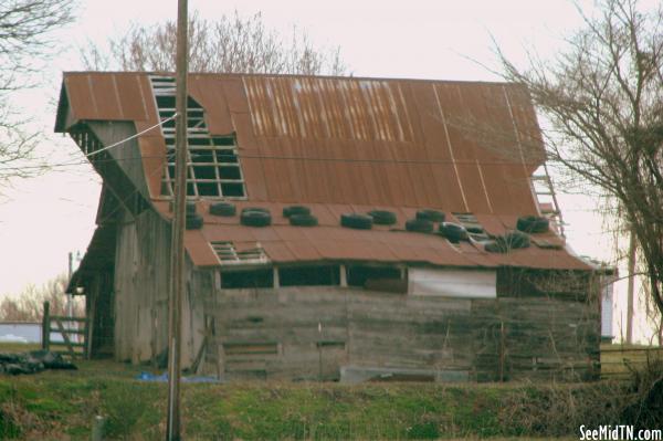Old Barn with Tires on the Roof