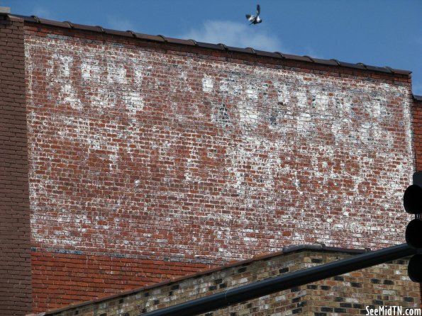 Faded Wall Advertisement Mural
