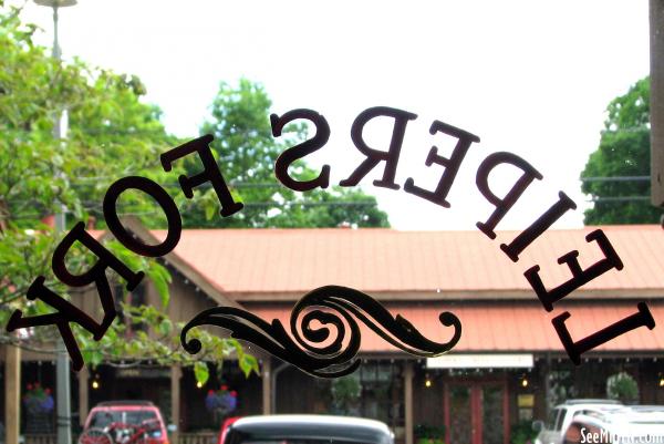 Leipers Fork painted on glass door
