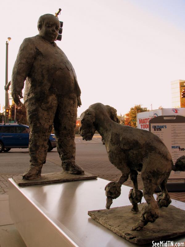 Man and Dog statue