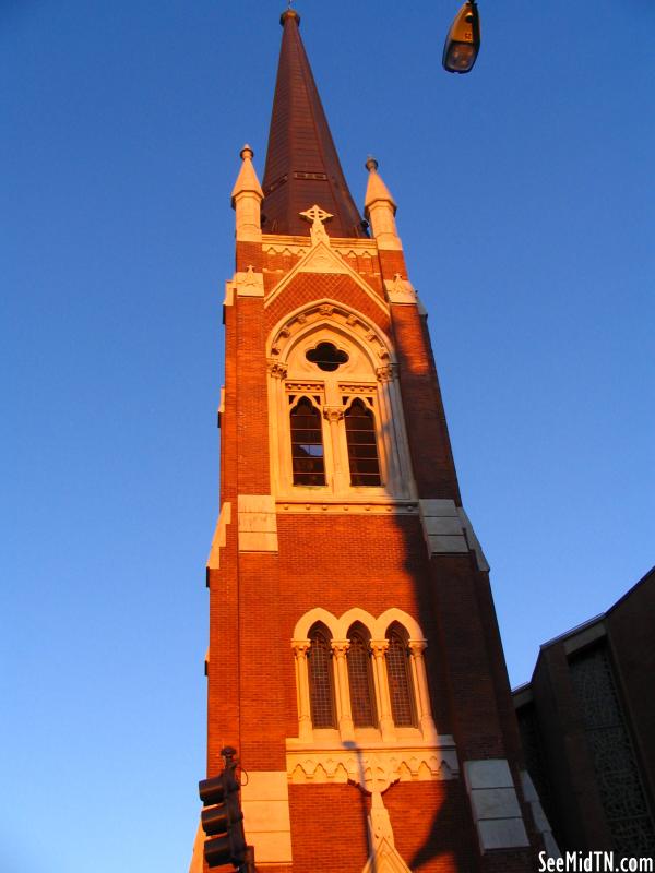 First Baptist Church tower near dusk