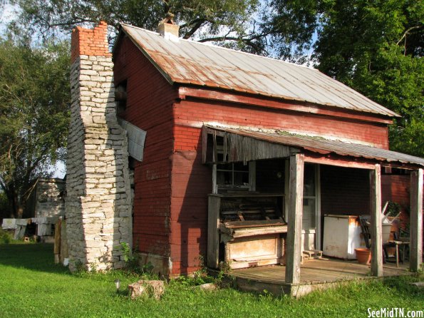 Abandoned House with Piano on Porch