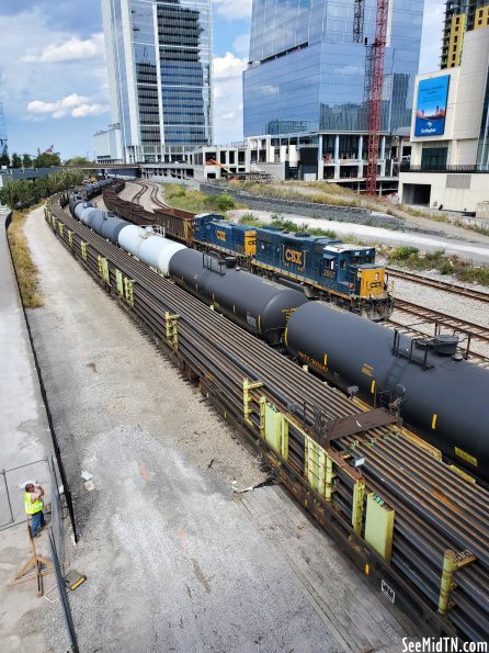 Gulch trains carrying replacement track from Broadway