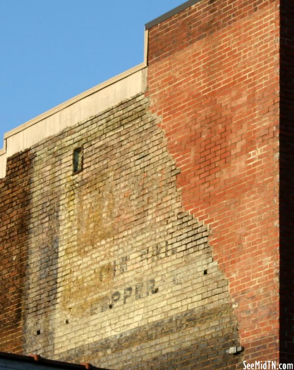 Faded ad along Main St. 