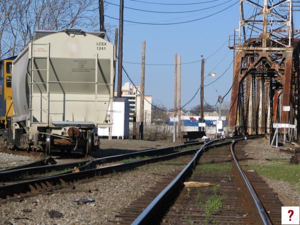 Behind a train