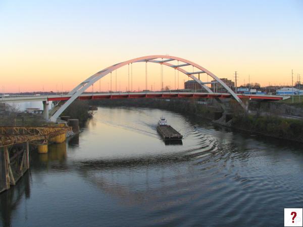 Korean Veterans Bridge at dusk with barge